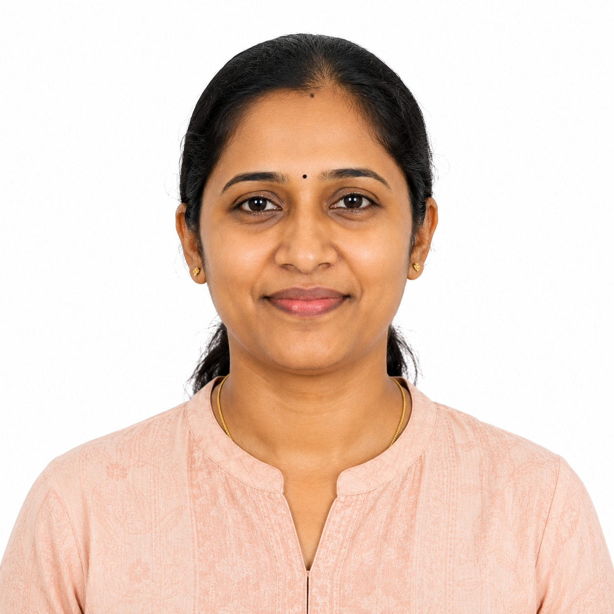 Portrait of a smiling Indian woman sharing her positive experience with TEREZA CARE home nursing and elderly care services.